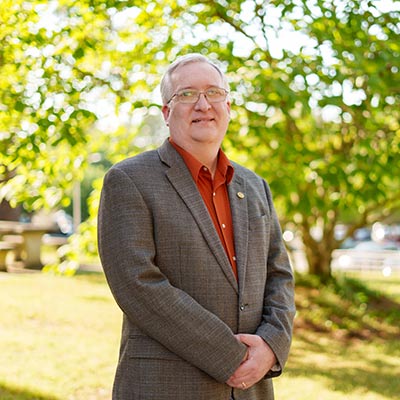 Dr. Jason W. Coym