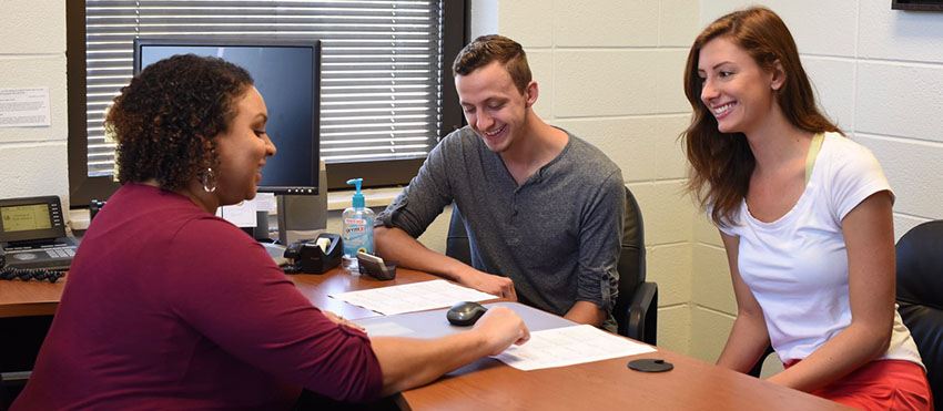 Prof. Rigsby and a student talking