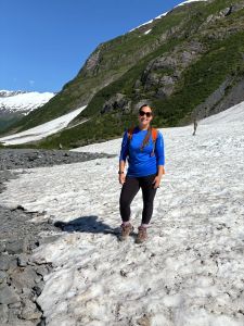 Student standing on an alaskan glacier