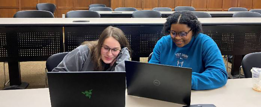 Students working on a group assignment together in a classroom