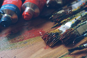 Paint brushes and paint.