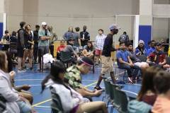 Students in gym at awards ceremony. 