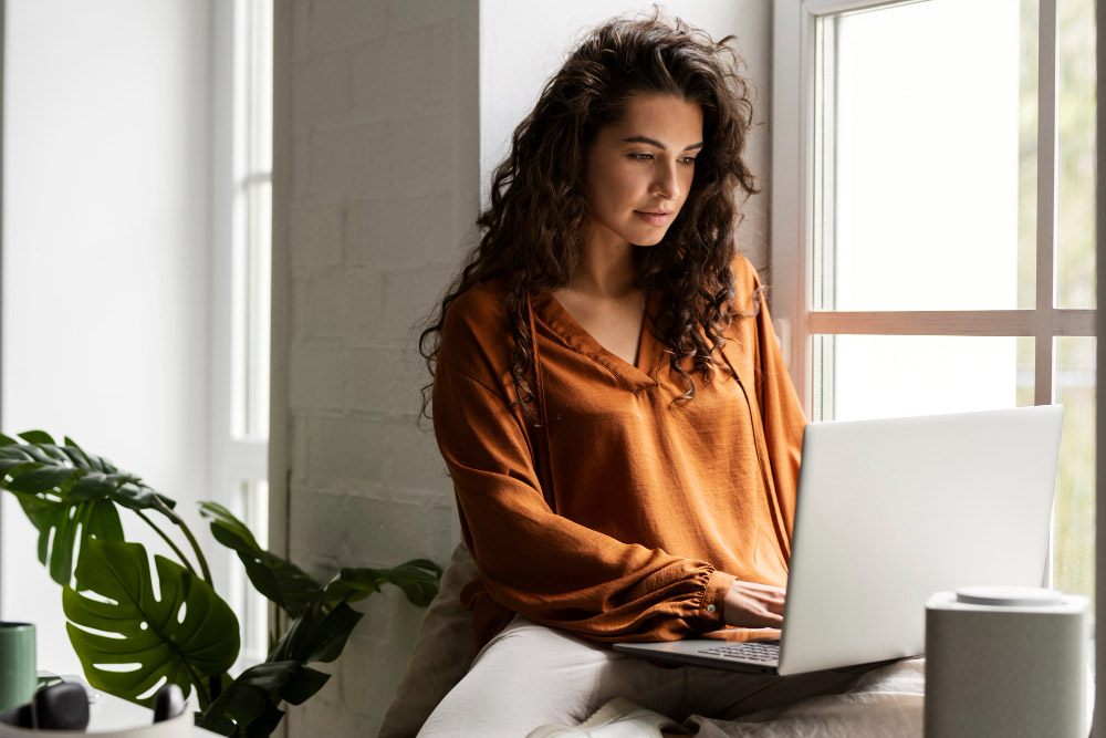 Woman styding in internet cafe