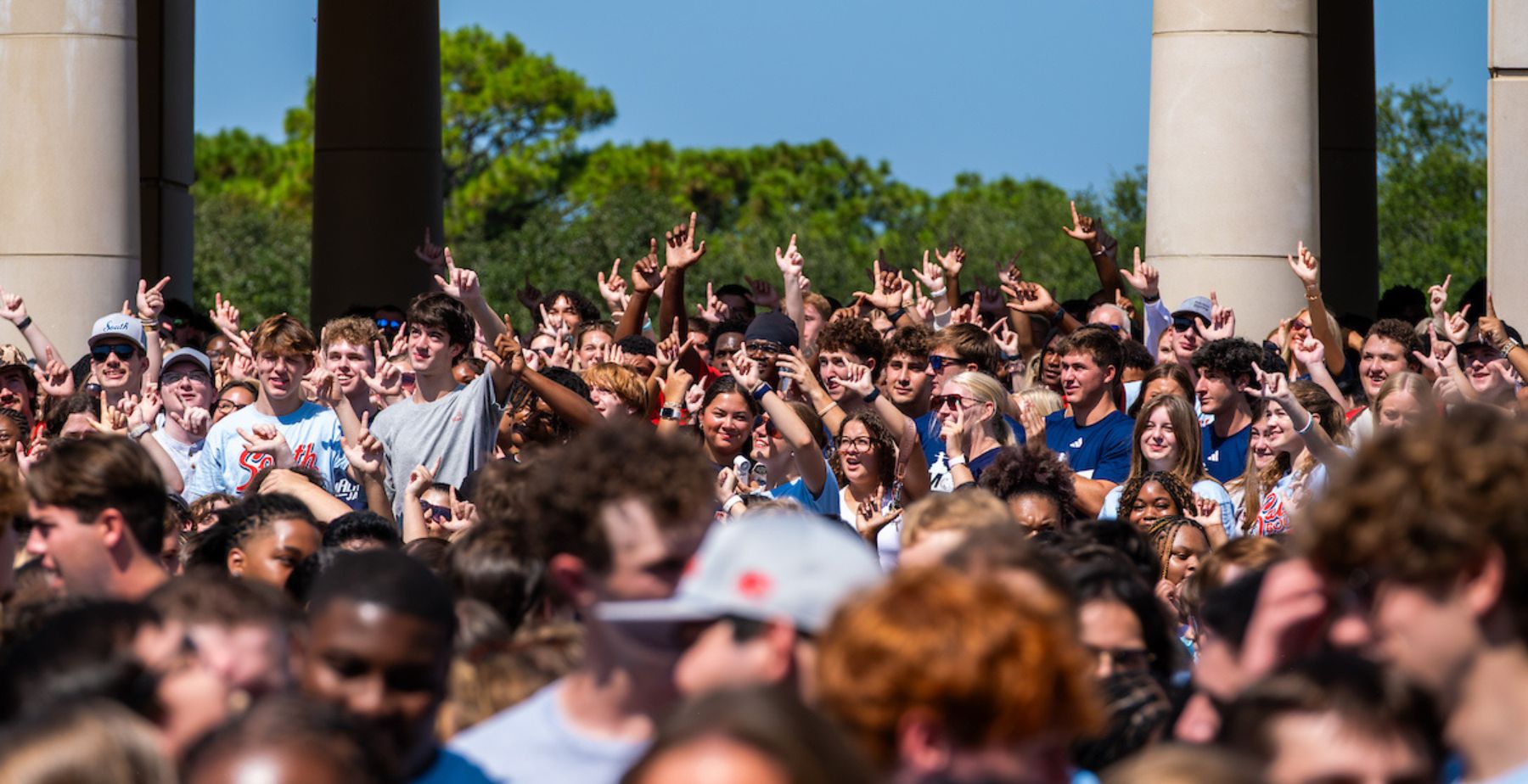 Members of the University of South Alabama’s Class of 2030 gathering at the Moulton Bell Tower and Alumni Plaza for a class photo. data-lightbox='featured'