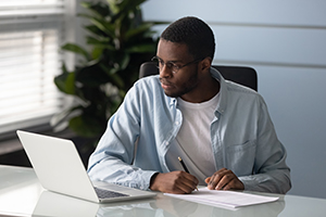 Male in front of computer