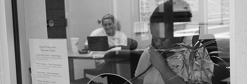 student workers working ticket desk for Jaguar Productions