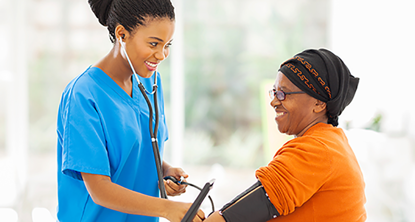 Nurse helping patient